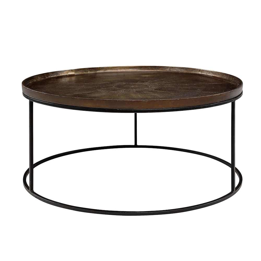 Artwood Fabio round coffee table with a textured vintage brass aluminium top and black iron frame.
