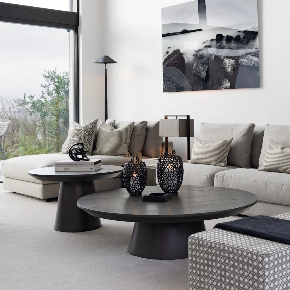 Artwood cloud coffee tables nested together.