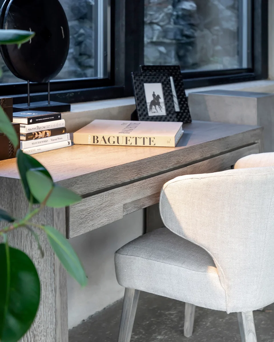 Artwood La Vella Dining Chair in a light linen fabric shown at a grey coloured desk.