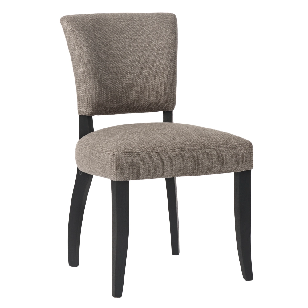 A fabric dining chair in a textured light brown fabric with black wooden legs.