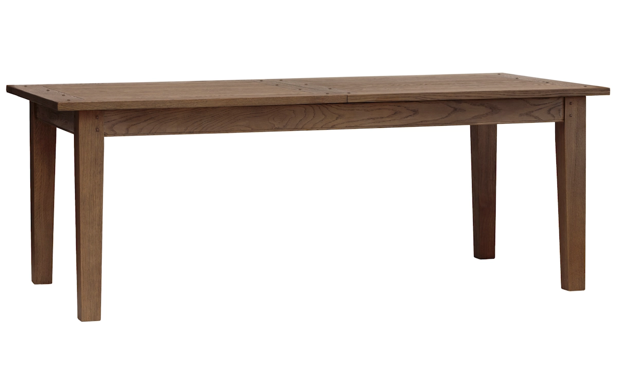 Large extension dining table in a lovely walnut brown oak wood.