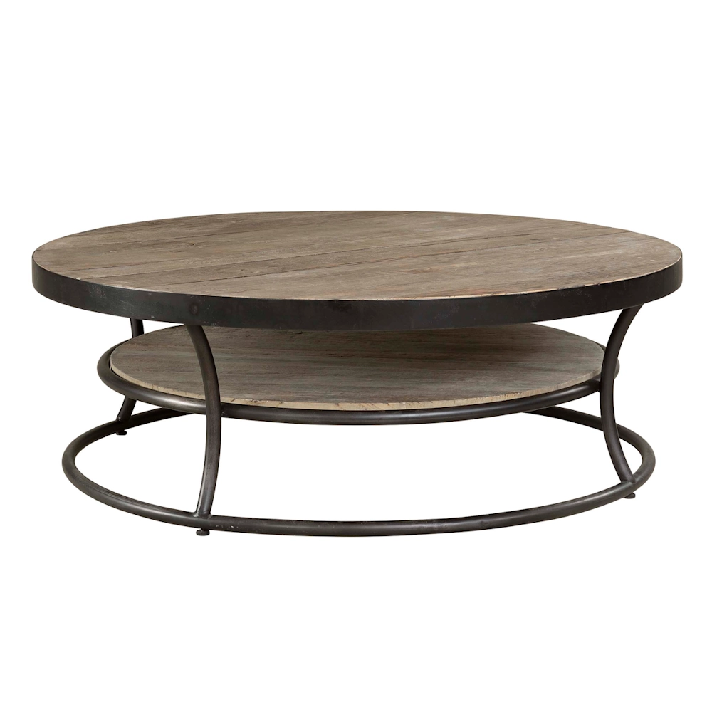 Artwood East round coffee table in old elm with a black metal frame and lower shelf, showcasing natural timber grain and rustic character.